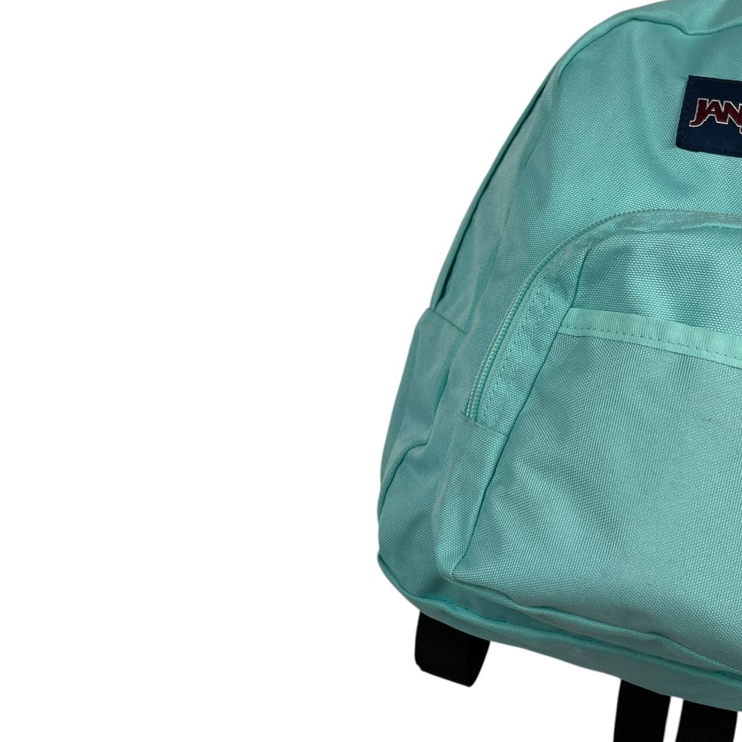 Mochila  JANSPORT  Celeste Medida 31cm X 25cm